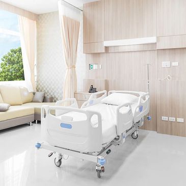 Photo of an empty hospital bed in a clean environment