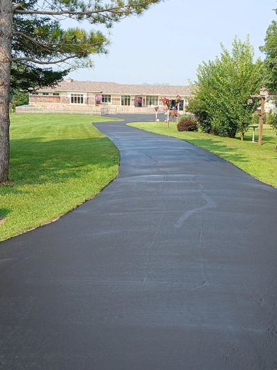 Fresh residential driveway sealcoating in Northfield, MN