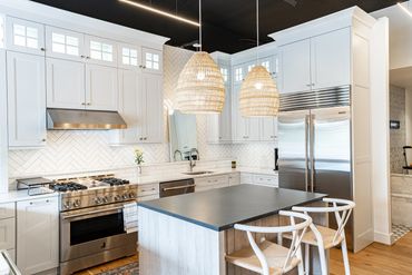 white kitchen design with an island