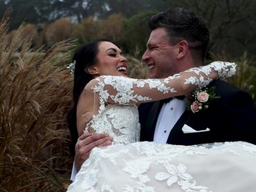 Wife lying in the arms of her Husband