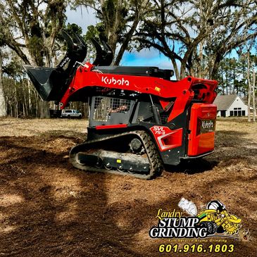 Our stump grinders paired with our skid steer get the work done quickly.
