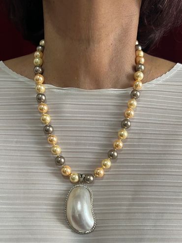 Handmade necklace with Shell Pearls and Shell Pendant.