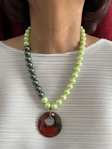 Handmade necklace with green tone Shell Pearls and Agate pendant.