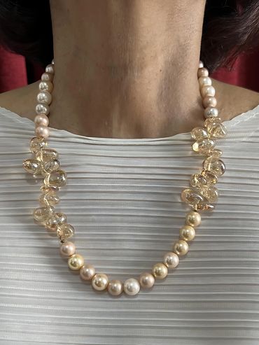 Handmade necklace with Crystal Quartz and light tone Shell Pearls.