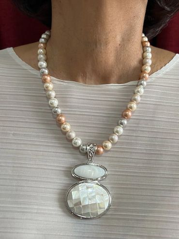 Handmade necklace with Shell Pearls and Shell Pendant.