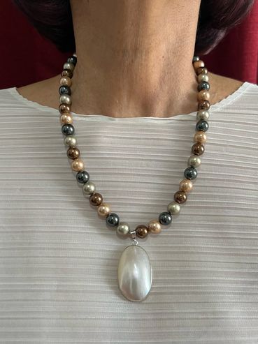 Handmade necklace with Shell Pearls and Shell Pendant.