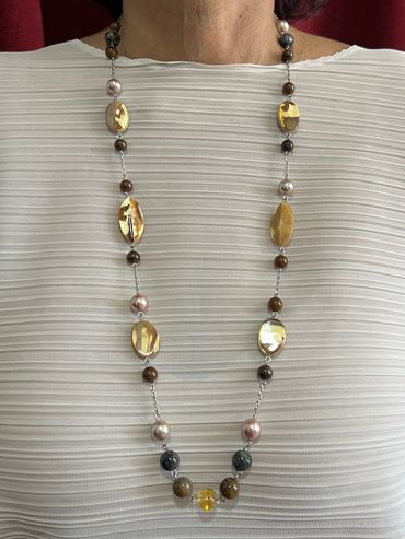 Handmade necklace with yellow Hematoid, Petesite and oval Mother of Pearl.