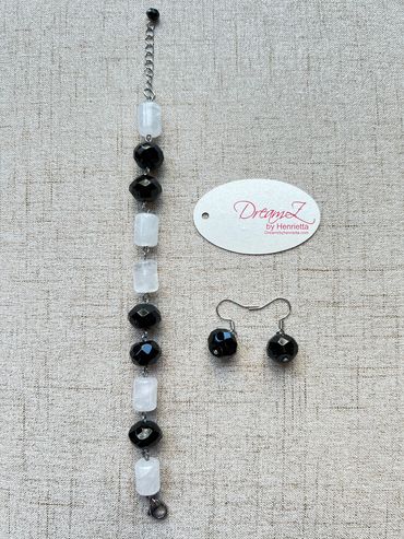 Handmade bracelet with faceted black Agate and clear Quartz.