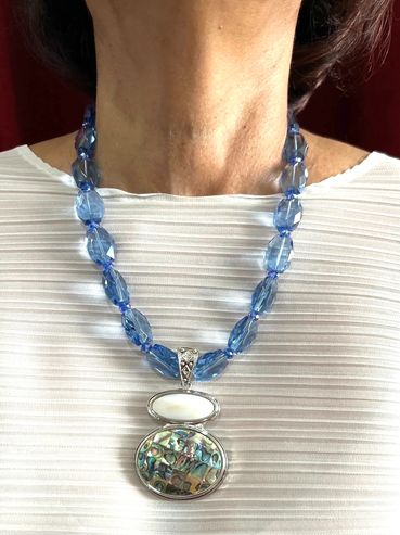 Handmade necklace
Abalone Pendant
Blue Crystal