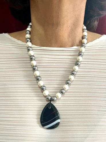 Handmade necklace
Shell Pearls
Onyx Pendant