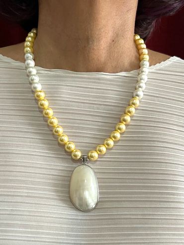 Handmade necklace
Shell Pearls
Shell Pendant