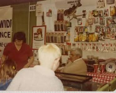 Sitting The Old Pro Gene Larew at the KC Sports Show. His wife Marie is in the red shirt.