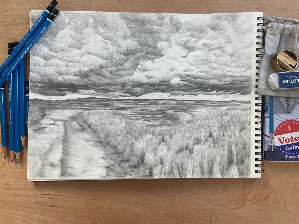 Graphite drawing of storm clouds over a marsh on Plum Island, Massachusetts. 