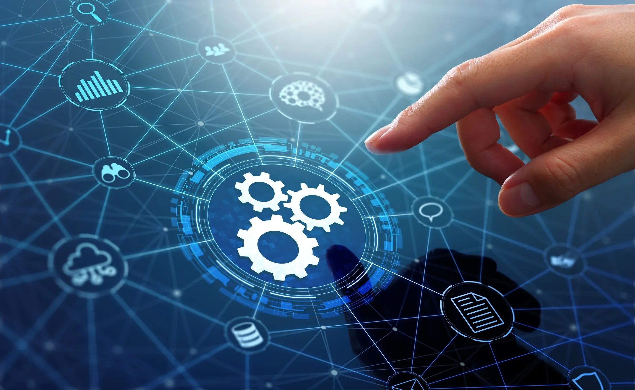 Hand interacting with a digital interface displaying interconnected technology icons.