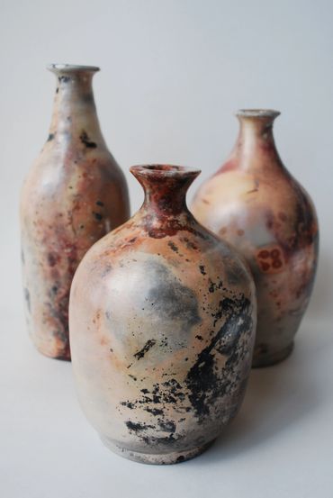 Trio of barrel fired bottles-5-7 inches tall