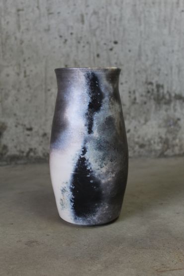 Tall barrel fired vase