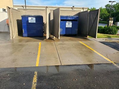 Apartment community dumpster corral pressure washing