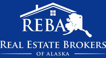 Logo for REBA Real Estate Brokers of Alaska featuring a house and Alaska map.