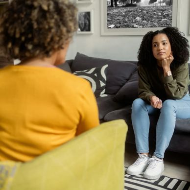 Woman having a mental health therapy sessions about trauma anxiety depression and marriage issues