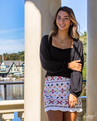 A women taking picture with lake view
