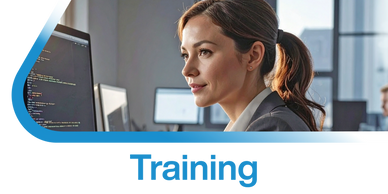 Focused woman working on coding training at computer in modern office.