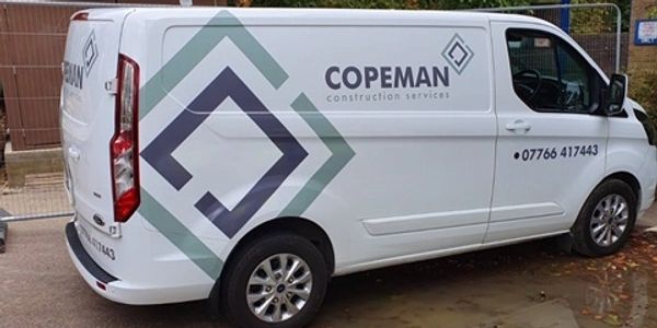 White van with the logo of Copeman Construction Services company