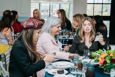 3 women enjoying their lunch.