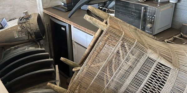 Woven basket or trap with a mechanical object.