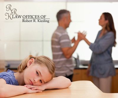 Parents arguing in front of a kid