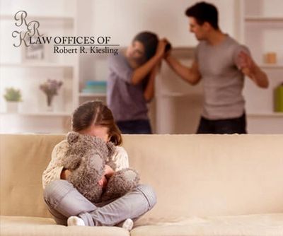 Parents fighting in front of a kid