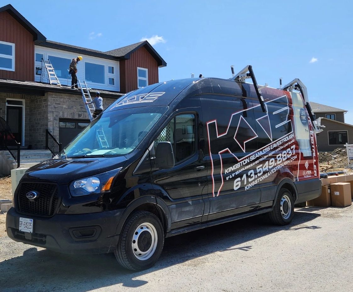 Kingston Seamless Eavestrough work vehicle parked at a construction site, ready for installation.