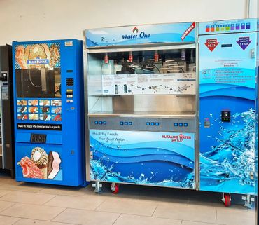 commercial water vending machine (model ws-3000) next to snack vending machine