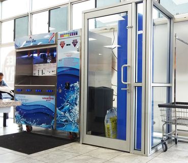commercial vending machine (model ws-3000) with storage tank in coin laundry store