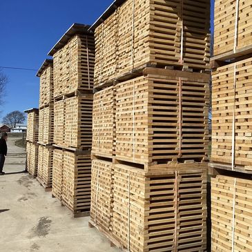 stacks of hardwood lumber from Trumbull County Hardwoods, a timber buyer logging company & timber coa