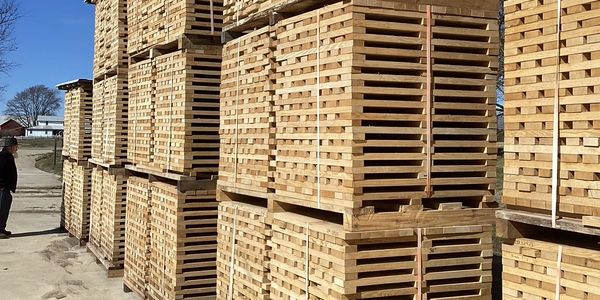 Stack of lumber at Trumbull County Hardwoods, a timber buyer, logging company, and timber company