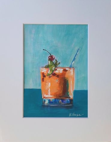 Cocktail with fruit and straw.