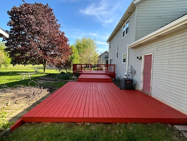 Valparaiso deck painted professionally by Smooth Finishing Painting. Residential and Commercial.