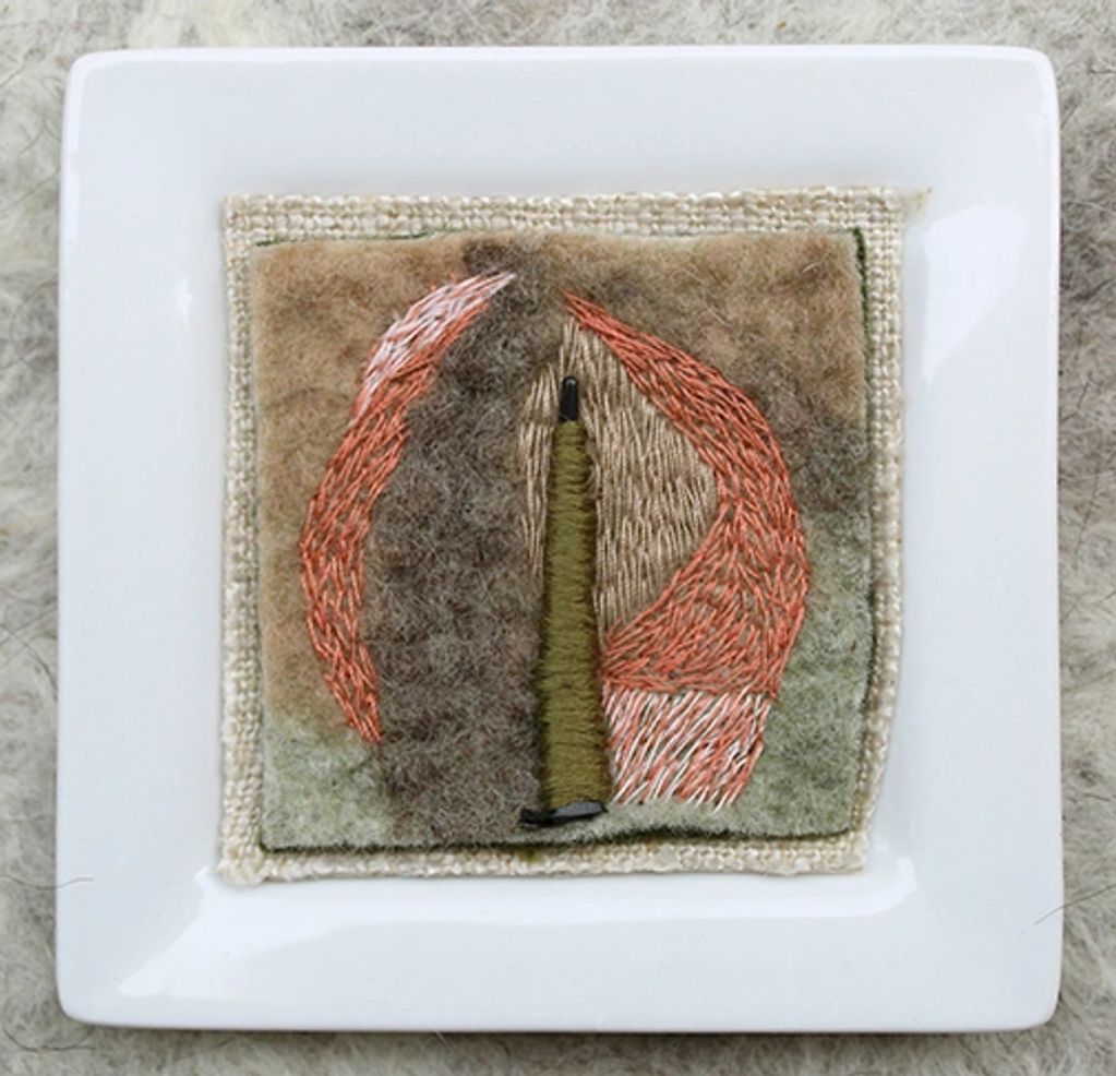 Kim Paxson, fiber art. mixed media.
Artist-made wool felt, hand embroidered,