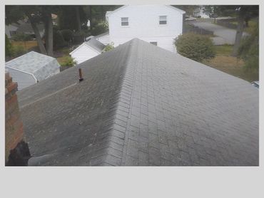 Old shingle roof requiring replacement