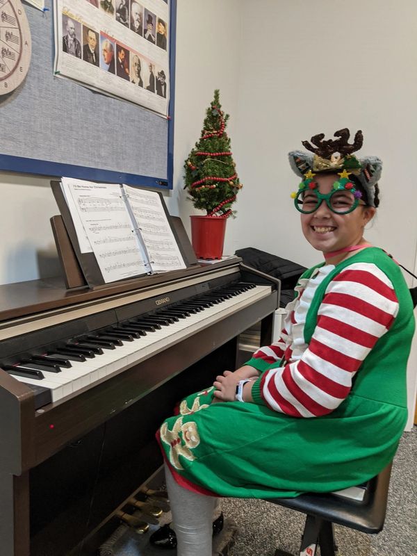 I love this student's willingness to dress up for the Virtual Senior Home Christmas Recital!
