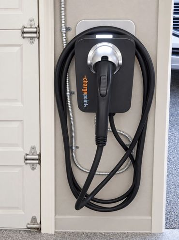 Mid City Electric EV charger project; surrounding finishes digitally restyled.