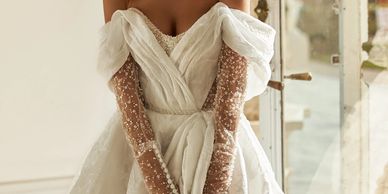 Bride in her finished custom wedding gown final reveal at Miledy Bridal Boutique in Raleigh, NC