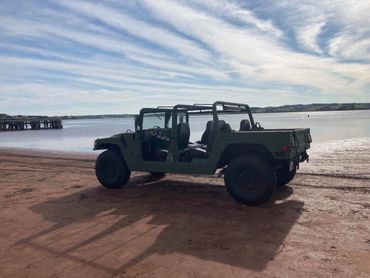 A parked Hummer car in the beach