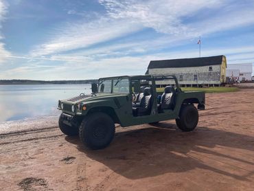 A parked Hummer car in the beach