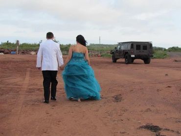 A couple wearing blue attire