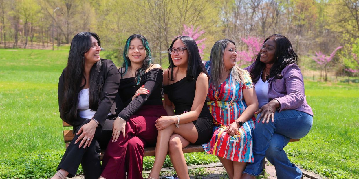 Group of laurel, Maryland hair stylists, nail techs, and estheticians smiling
