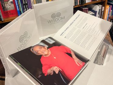 Book display of Wisdom of the Century at Books & Books in Coral Gables, FL