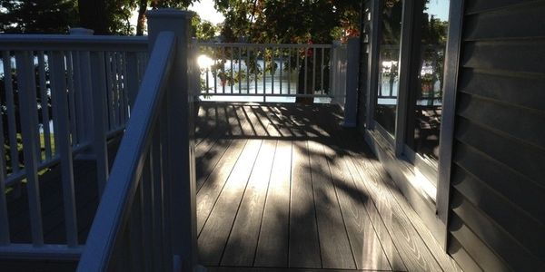 Deck renovation composite decking design Timbertech Azek railing premium decking builder designer

