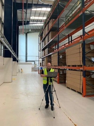 Chris Thomas, Litenet engineer, performing a signal survey in a warehouse