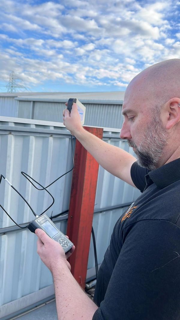 Chris Thomas from Litenet carrying out a location survey